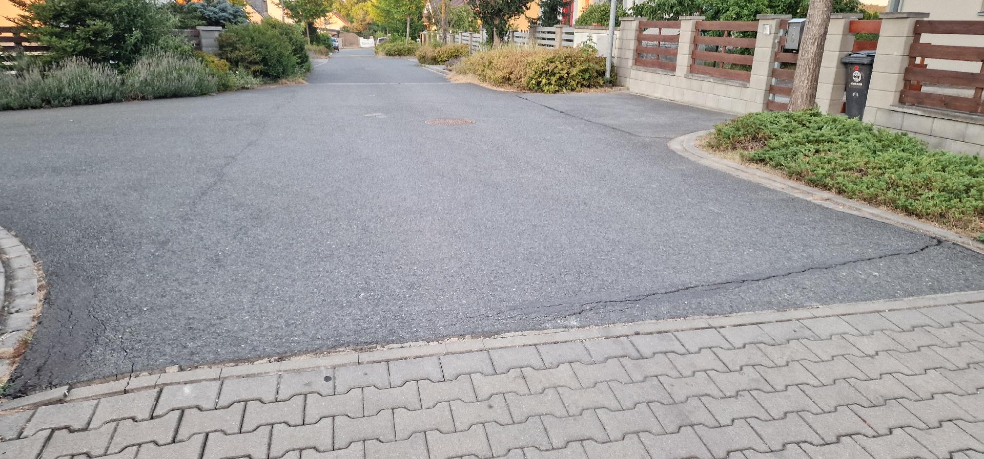 Zvednutý/deformovaný asfalt