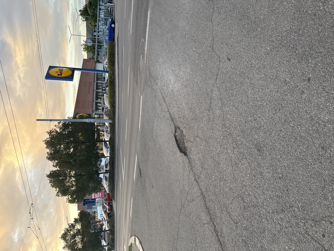 Výmol ve vozovce